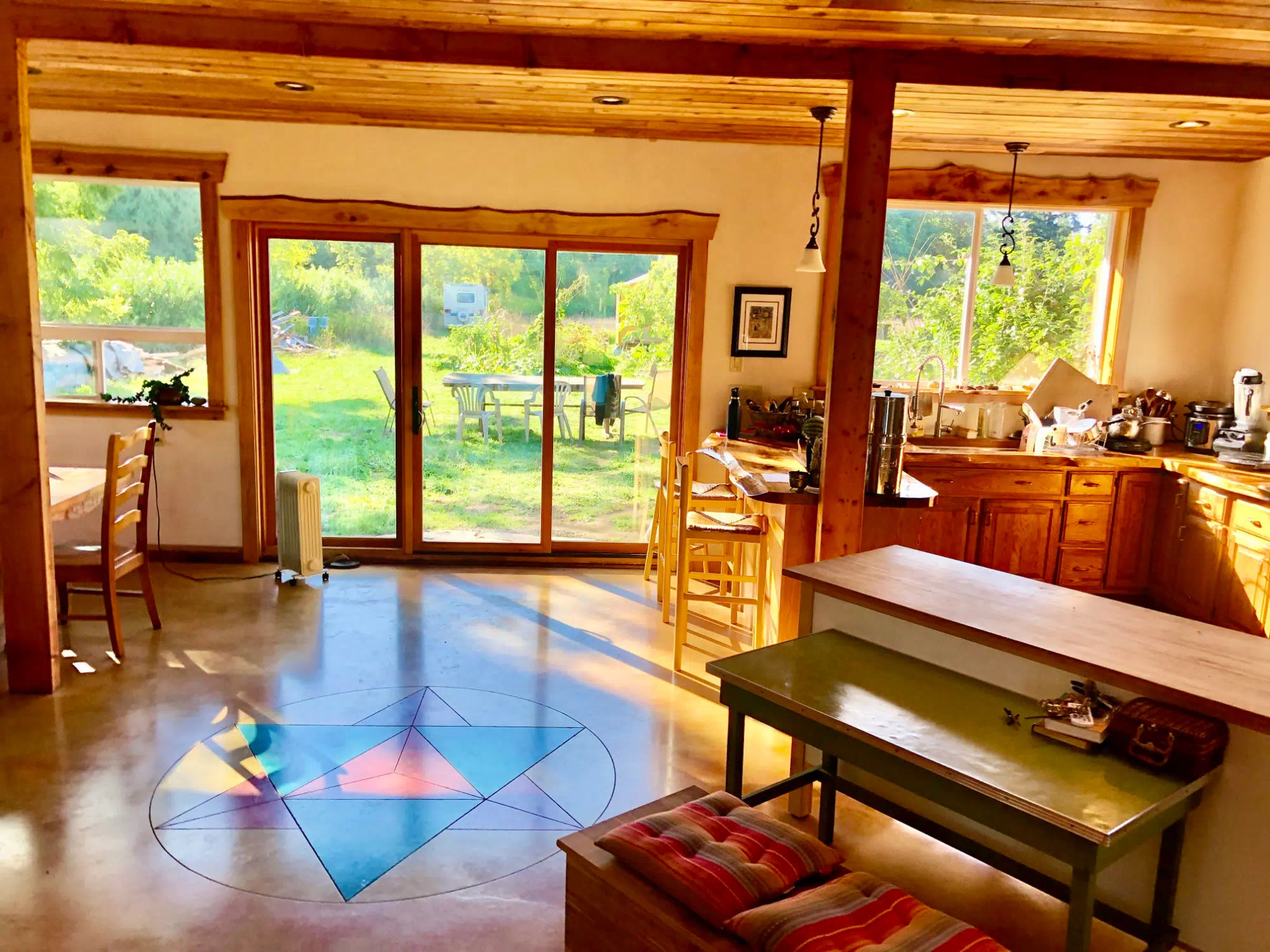 Timber beam interior with open kitchen and living space